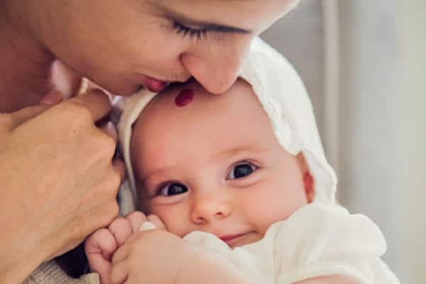 mother caring for infant with hemangioma